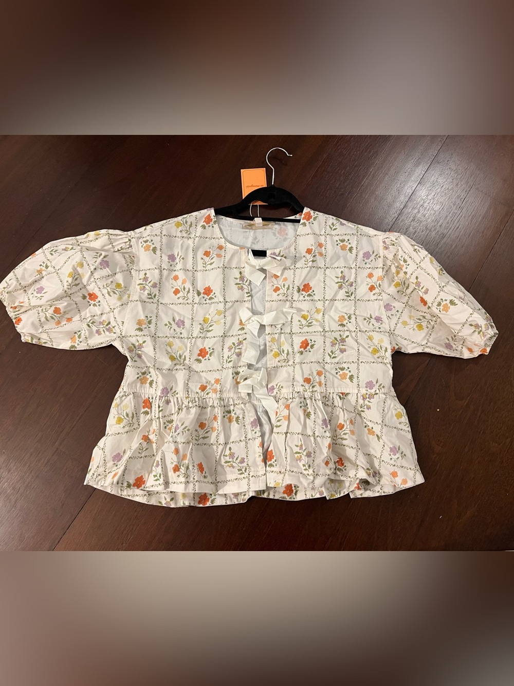 La Maregold White Floral Ruffle Peplum Tie Top